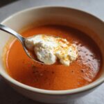 Spoonful of High Protein Tomato Soup with Cottage Cheese. Creamy cottage cheese adds a protein boost to this tomato soup.