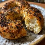 Close-up of protein bagels with greek yogurt oven, showing the bagel's texture and filling.