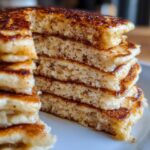 A stack of golden brown sourdough discard pancakes, showcasing a delicious way to use sourdough discard recipes.