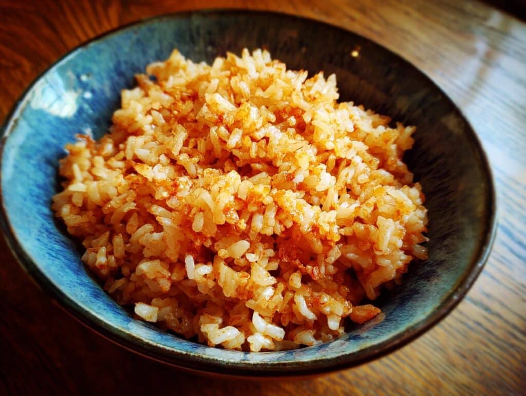 A bowl of savory rice, not related to baked blueberry cottage cheese breakfast bowls.